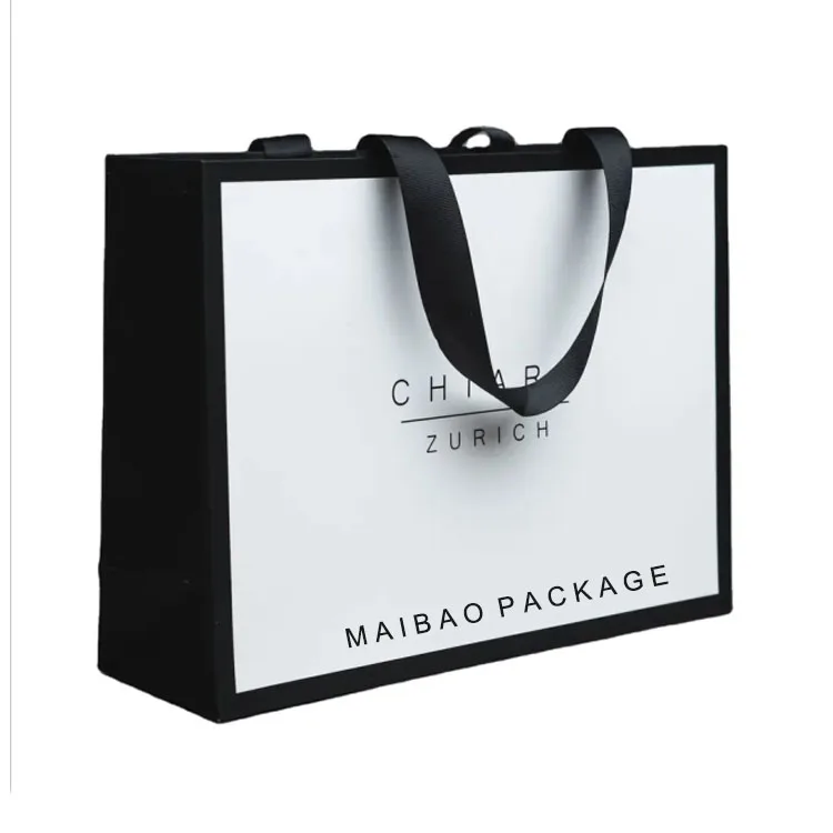 Индивидуальные бумажные пакеты для покупок из черного картона с принтом логотипа и ленточной ручкой для обуви для одежды