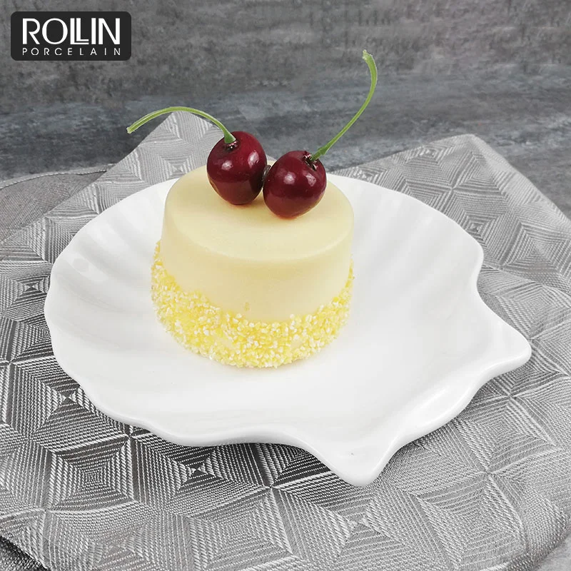 Оптовая продажа, белый гребешок, фарфоровая керамическая безопасная тарелка в форме ракушки, белая керамическая посуда, керамическая посуда в форме ракушки