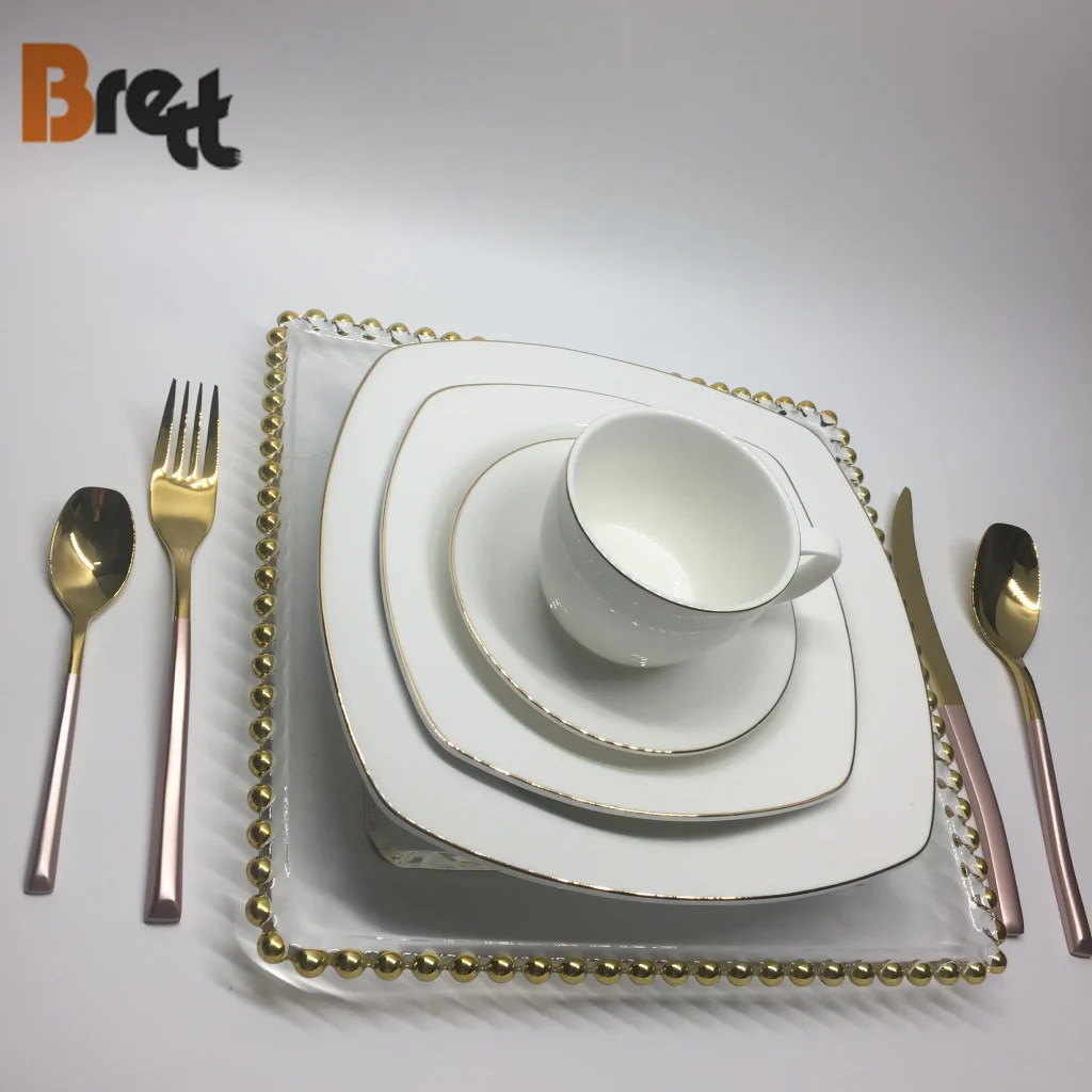 Свадебные керамические зарядные тарелки с золотой оправой, украшенные бисером, бокал для шампанского, чашка, квадратная круглая посуда для ужина, фарфоровая упаковка для отелей