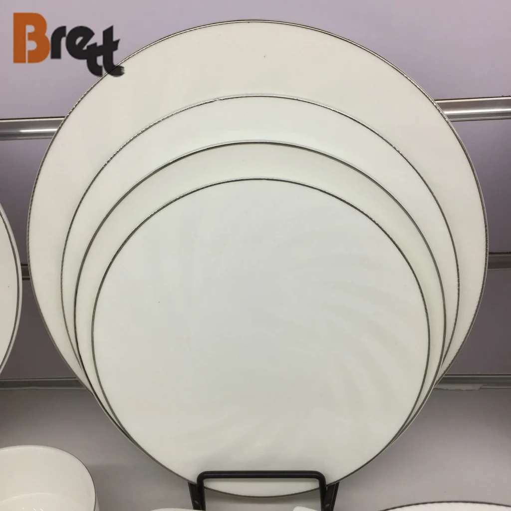 Горячая продажа Гуанчжоу Посуда из костяного фарфора 72 шт. Обеденный набор с золотой серебряной оправой