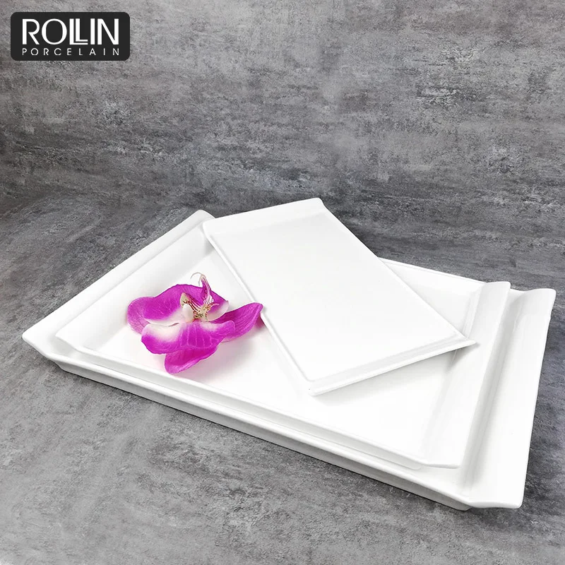 Белые обеденные тарелки оптом. Хорошие белые прямоугольные фарфоровые тарелки. Керамические белые обеденные тарелки.