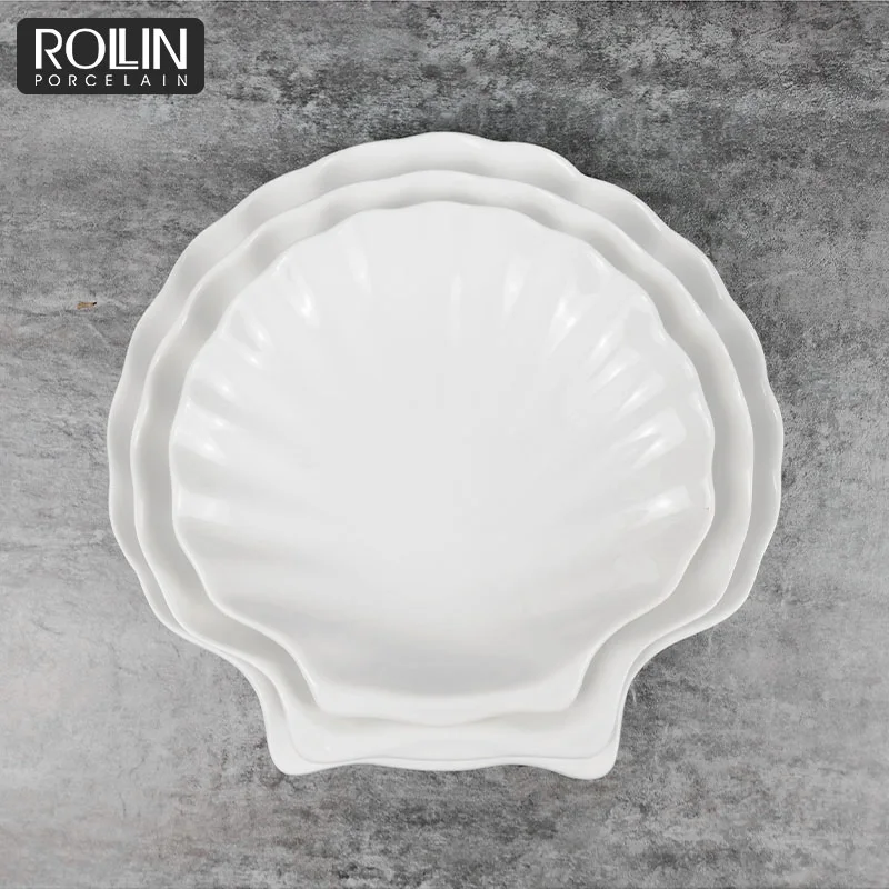 Оптовая продажа, белый гребешок, фарфоровая керамическая безопасная тарелка в форме ракушки, белая керамическая посуда, керамическая посуда в форме ракушки