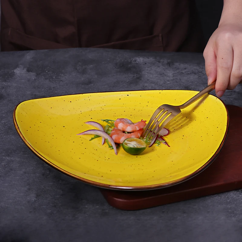 Желтые обеденные тарелки Керамическая посуда Яйцо Керамический фарфор неправильной формы Geschirr Оптовая продажа Посуда Ресторанные обеденные тарелки